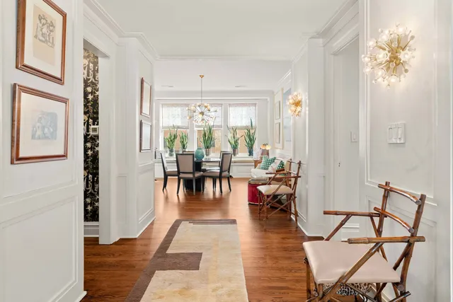 a view of a livingroom with furniture and a window