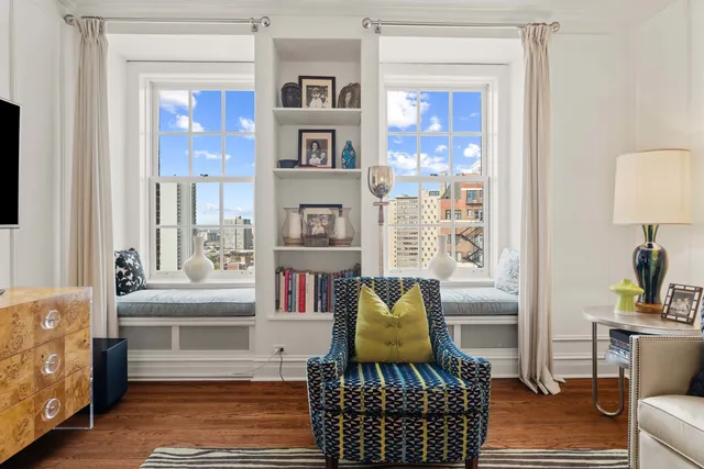 a living room with furniture and a window