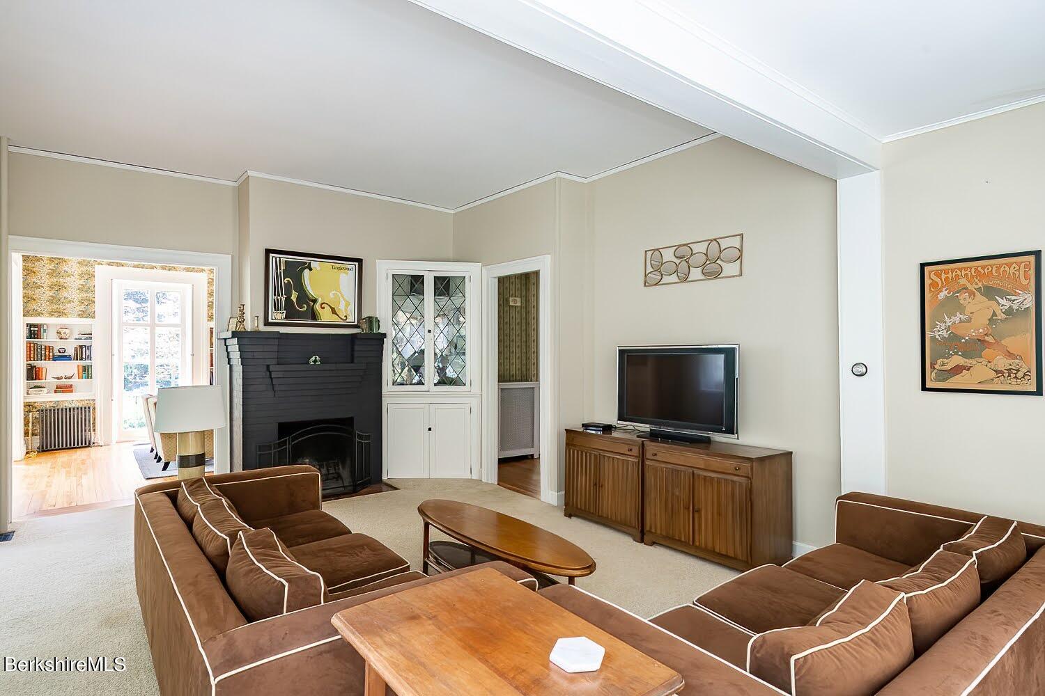 39 Main Street Stockbridge, MA 01262 - Photo 14 of 39 a living room with furniture and a flat screen tv