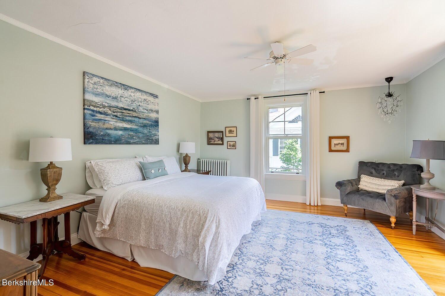 39 Main Street Stockbridge, MA 01262 - Photo 21 of 39 a spacious bedroom with a bed a window and a dresser