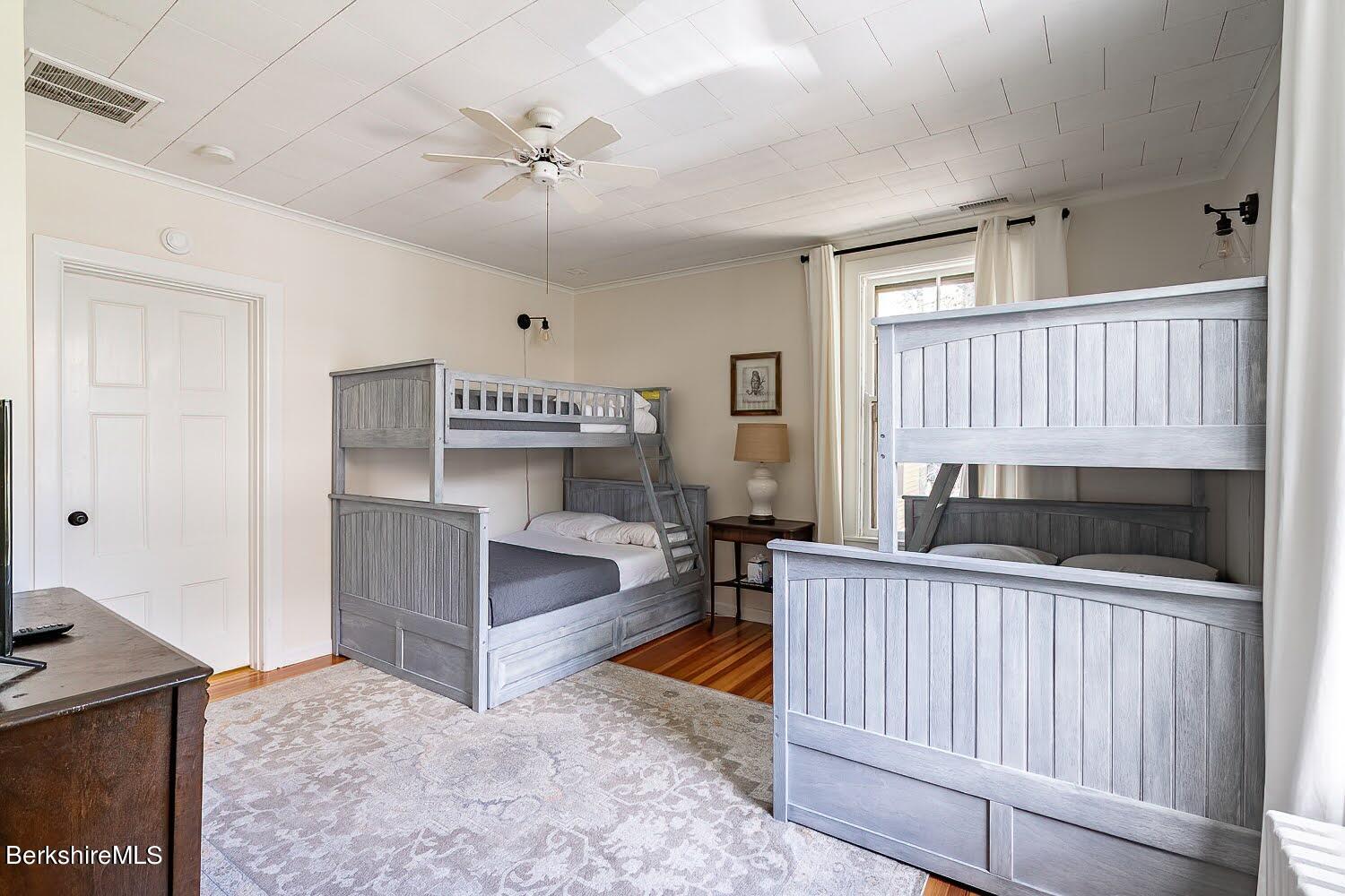 39 Main Street Stockbridge, MA 01262 - Photo 23 of 39 a bedroom with furniture and a fireplace