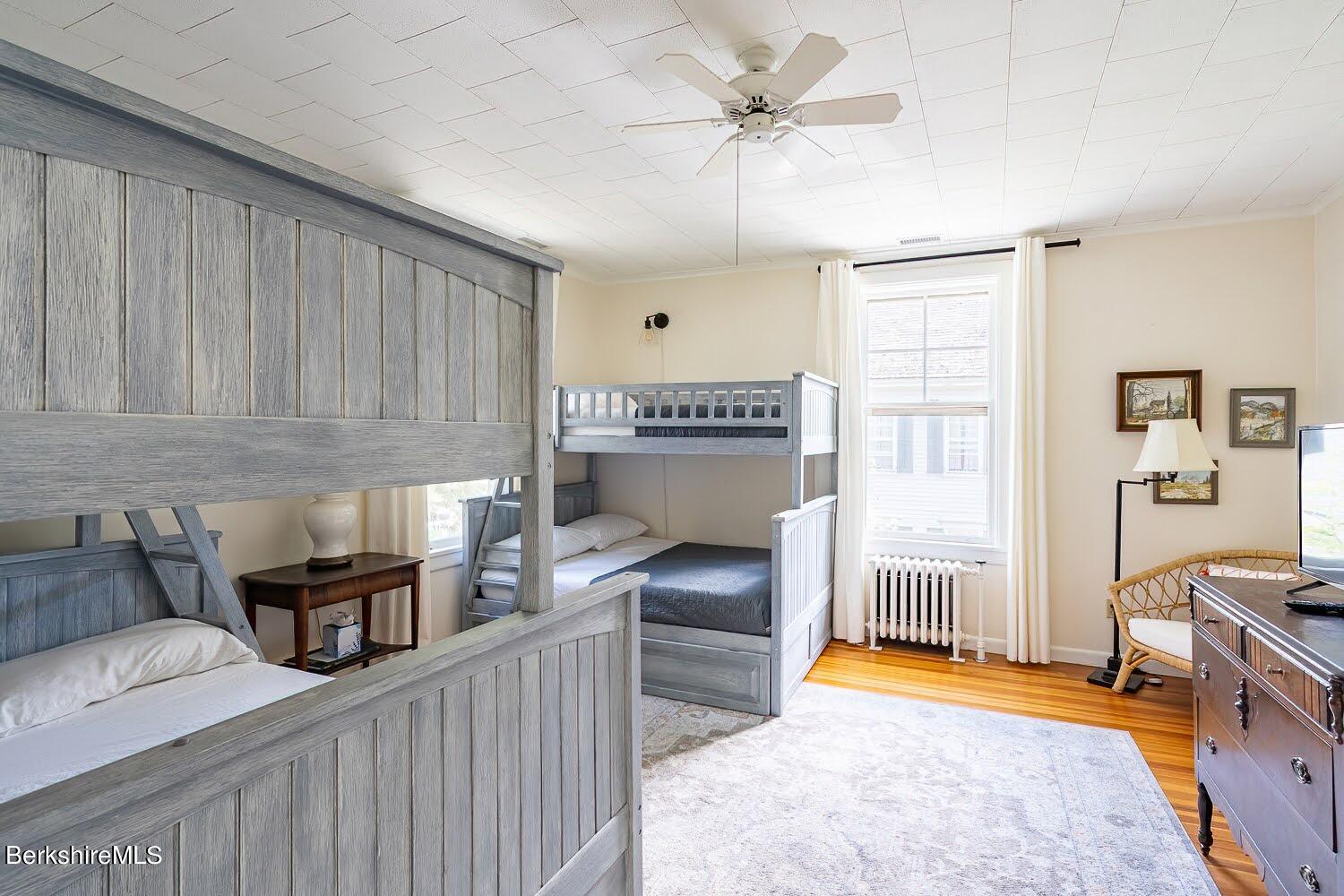 39 Main Street Stockbridge, MA 01262 - Photo 24 of 39 a bed room with a bed and a couch