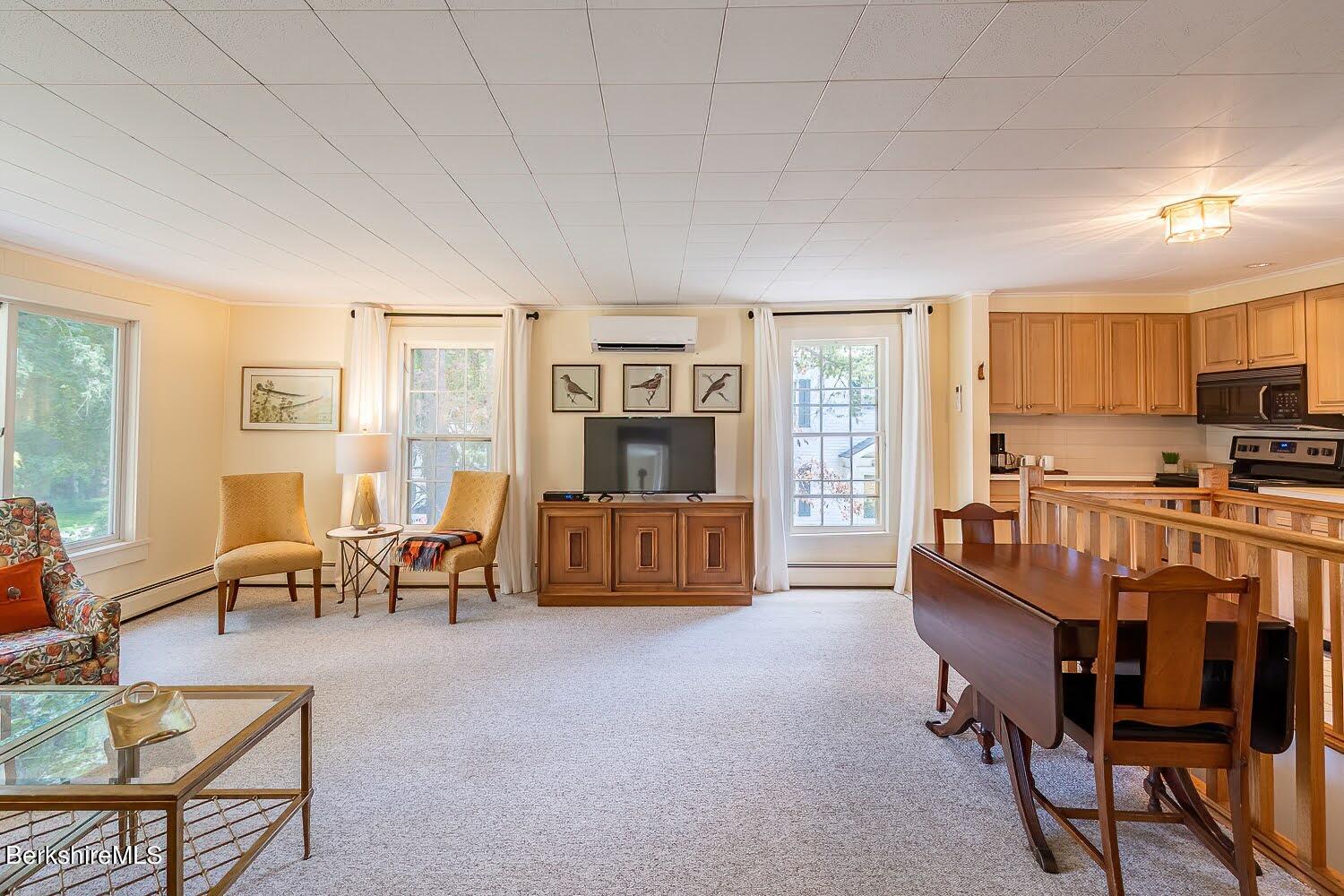39 Main Street Stockbridge, MA 01262 - Photo 29 of 39 a living room with furniture and a flat screen tv