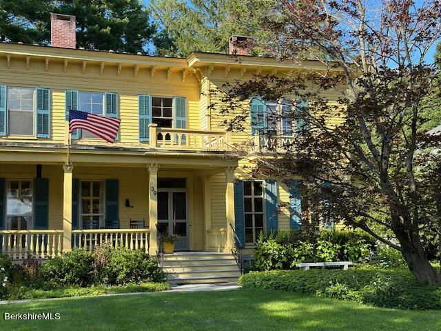 39 Main Street Stockbridge, MA 01262 - Photo 3 of 39 a front view of a house with a yard