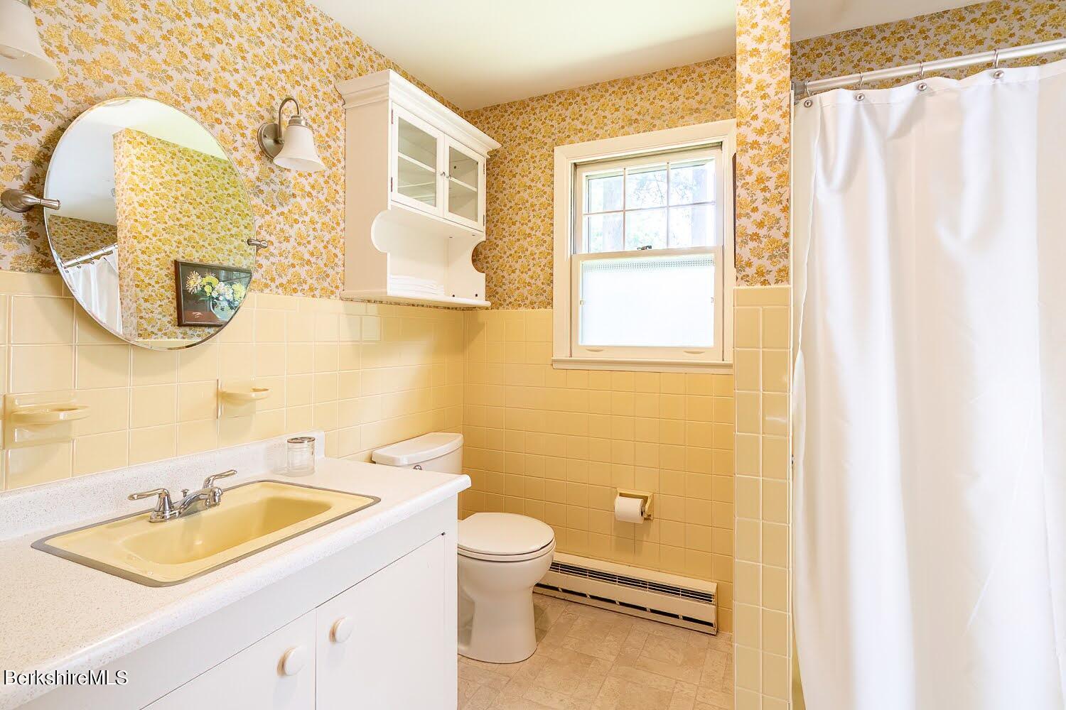 39 Main Street Stockbridge, MA 01262 - Photo 37 of 39 a bathroom with a sink and a mirror