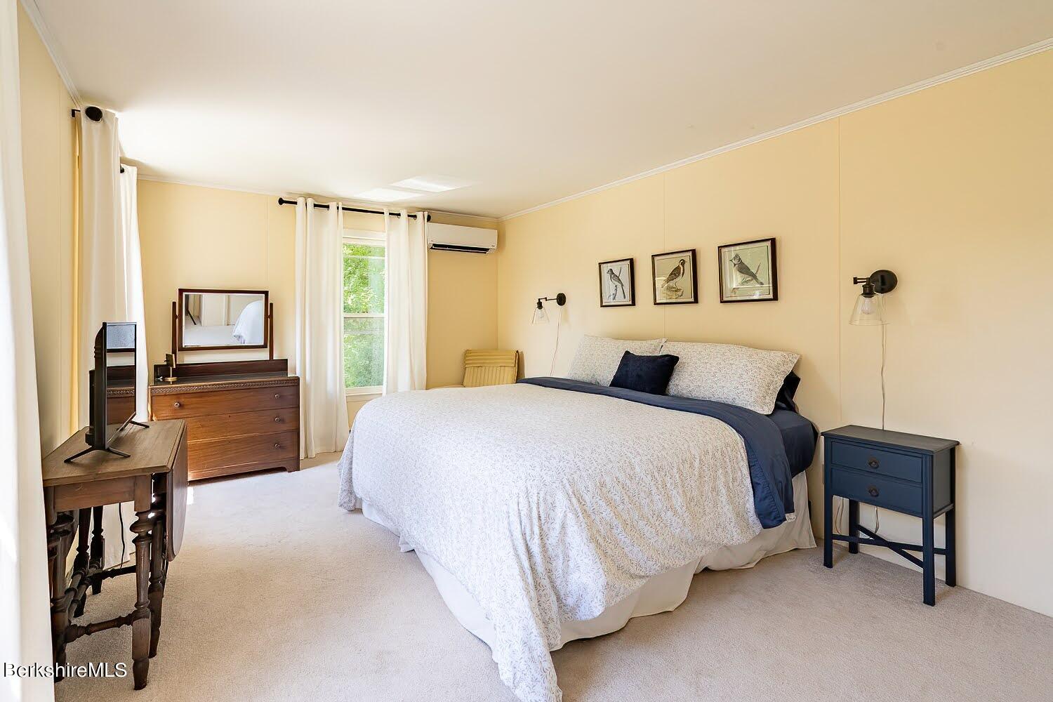 39 Main Street Stockbridge, MA 01262 - Photo 39 of 39 a bedroom with a large bed and a night stand