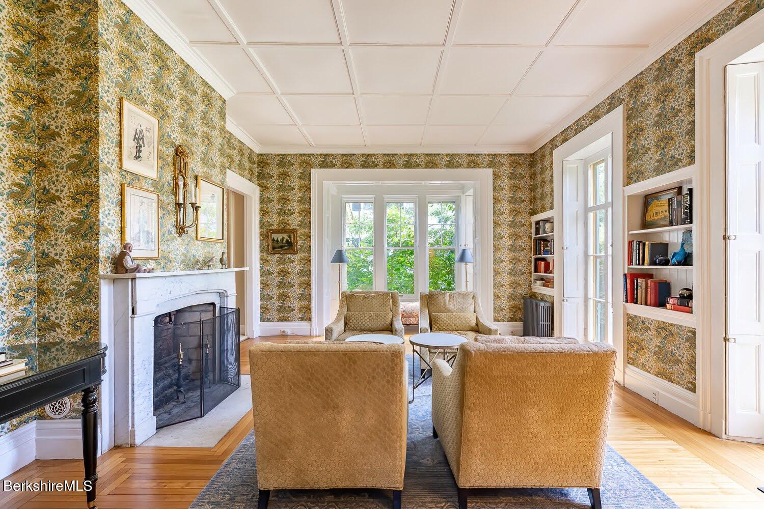 39 Main Street Stockbridge, MA 01262 - Photo 8 of 39 a living room with furniture and a fireplace