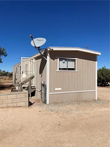a view of street with large tree