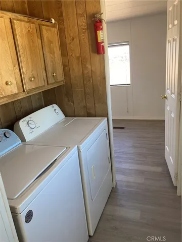 a bathroom with a sink vanity and mirror
