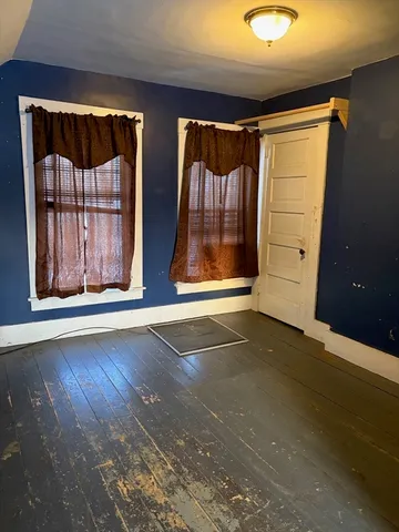 a view of a porch with furniture