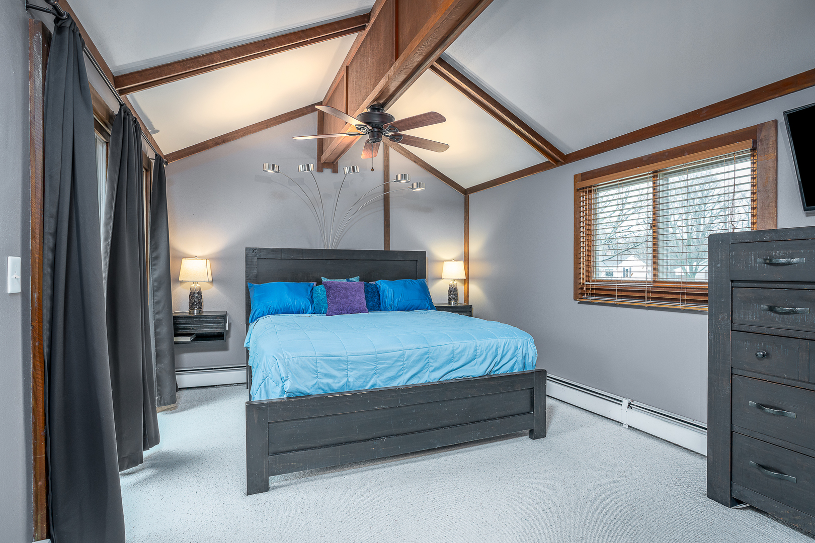 5302 32nd Avenue Moline, IL 61265 - Photo 16 of 30 a bed sitting in a bedroom next to a window