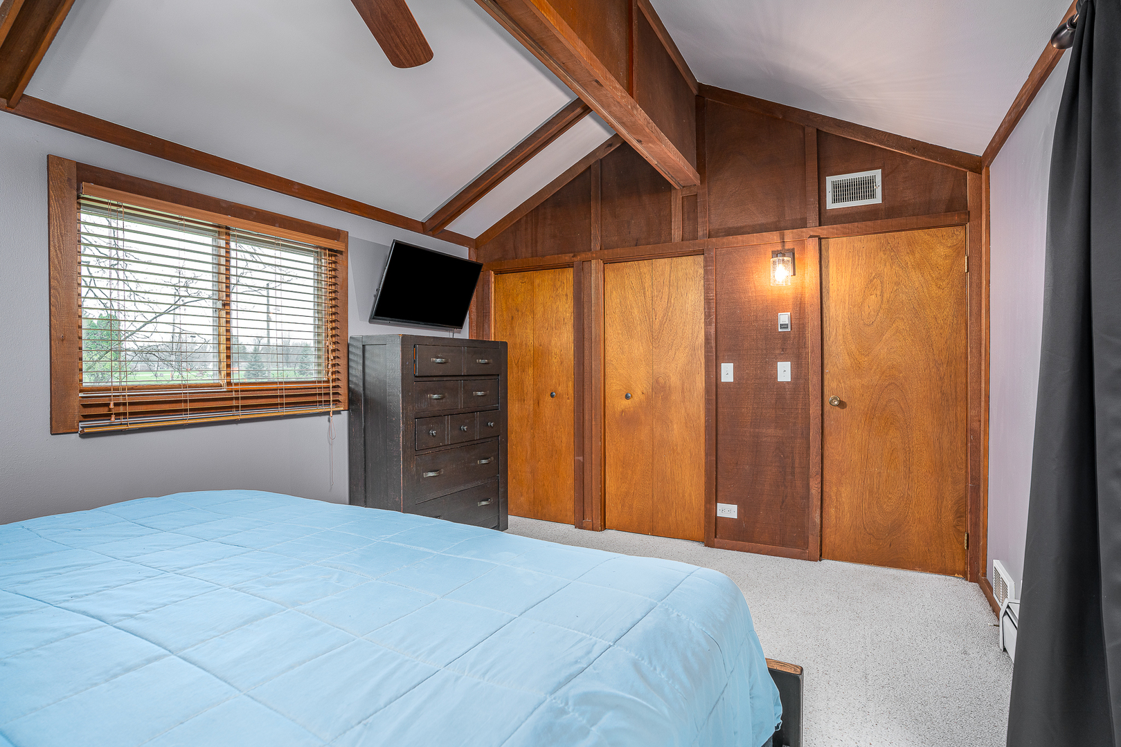 5302 32nd Avenue Moline, IL 61265 - Photo 17 of 30 a bedroom with a bed and a television