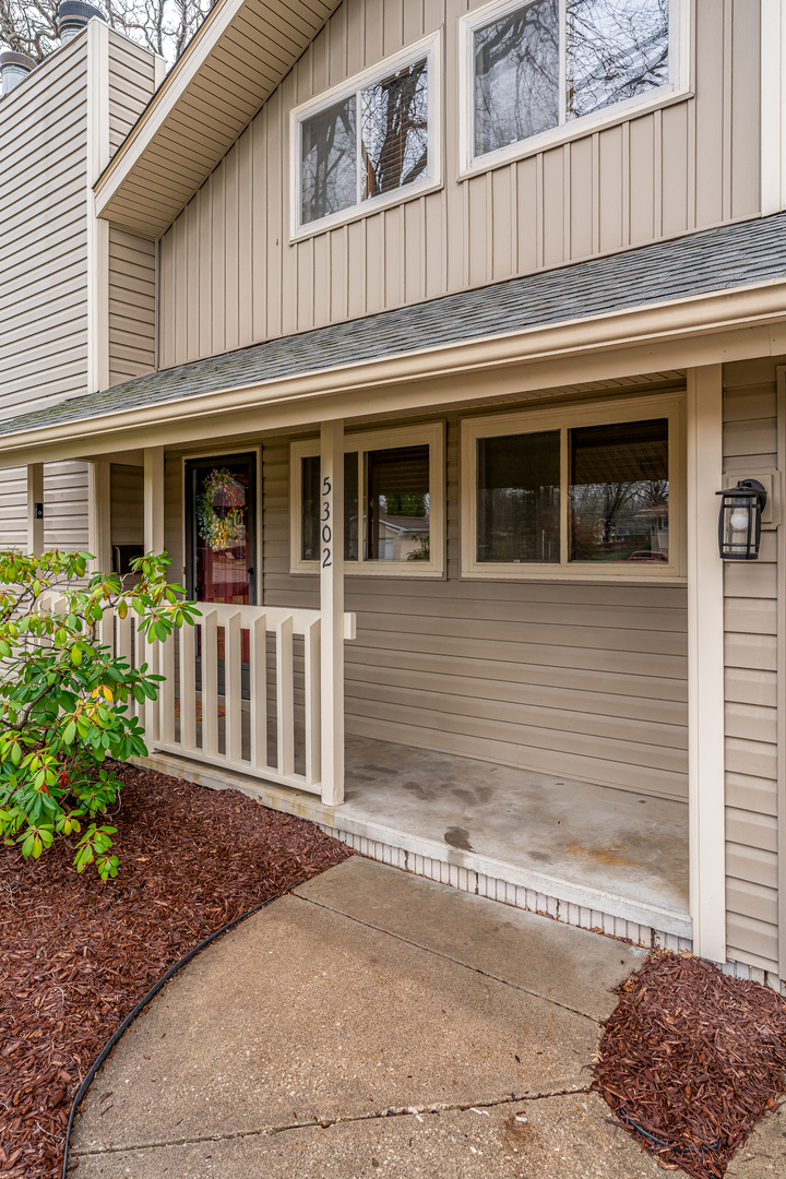 5302 32nd Avenue Moline, IL 61265 - Photo 2 of 30 a front view of a house with a yard