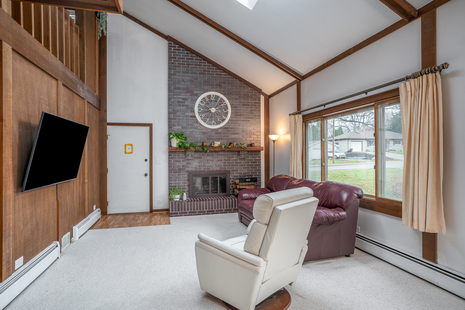 5302 32nd Avenue Moline, IL 61265 - Photo 6 of 30 a living room with furniture and a flat screen tv