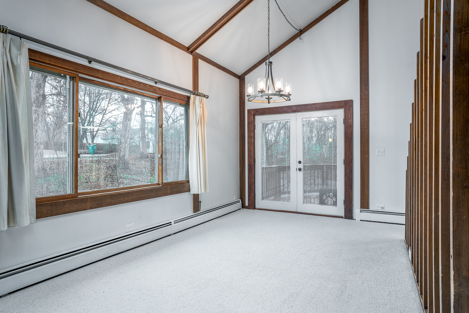 5302 32nd Avenue Moline, IL 61265 - Photo 9 of 30 a view of empty room with floor to ceiling window and floor