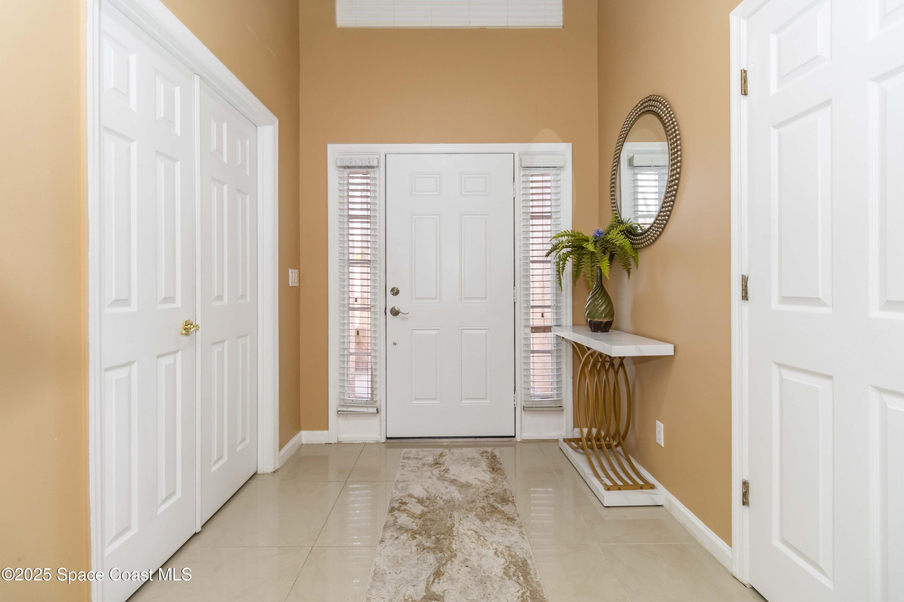 185 Wading Bird Circle Southwest Palm Bay, FL 32908 - Photo 2 of 19 Front entrance inside the house