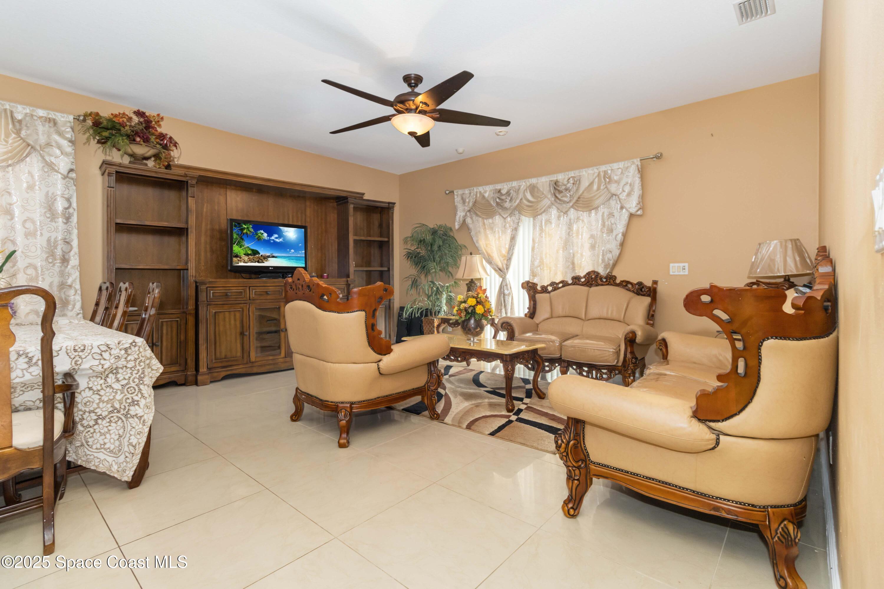185 Wading Bird Circle Southwest Palm Bay, FL 32908 - Photo 5 of 19 Living room