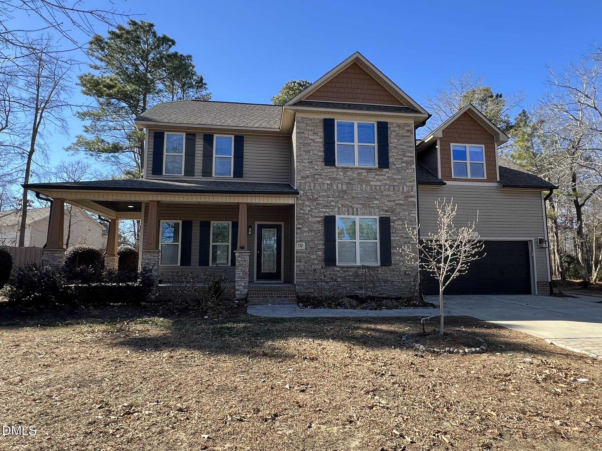 19 Eaton Drive Angier, NC 27501 - Photo 1 of 17 a front view of a house with yard