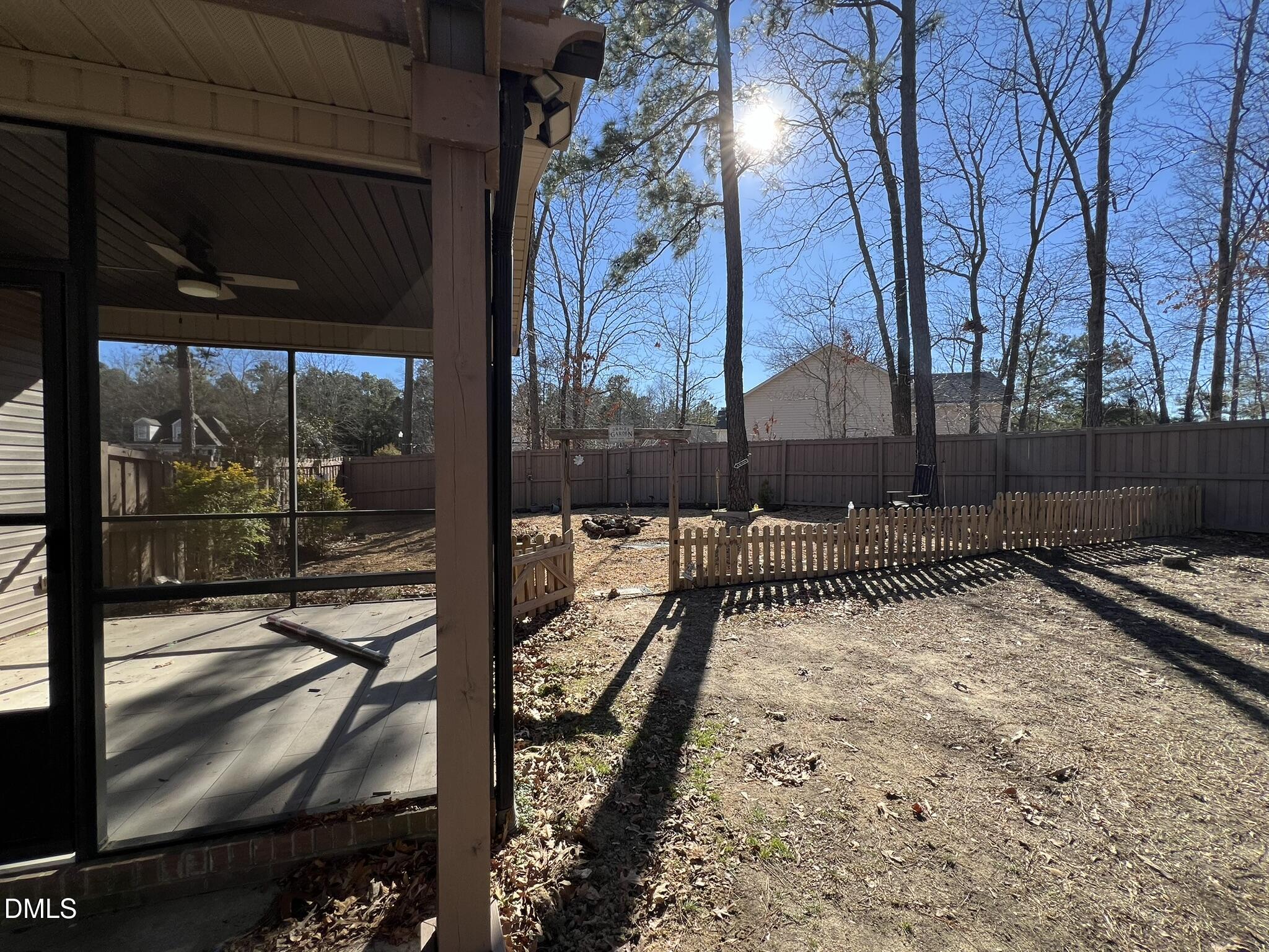 19 Eaton Drive Angier, NC 27501 - Photo 17 of 17 a view of a yard with a tree