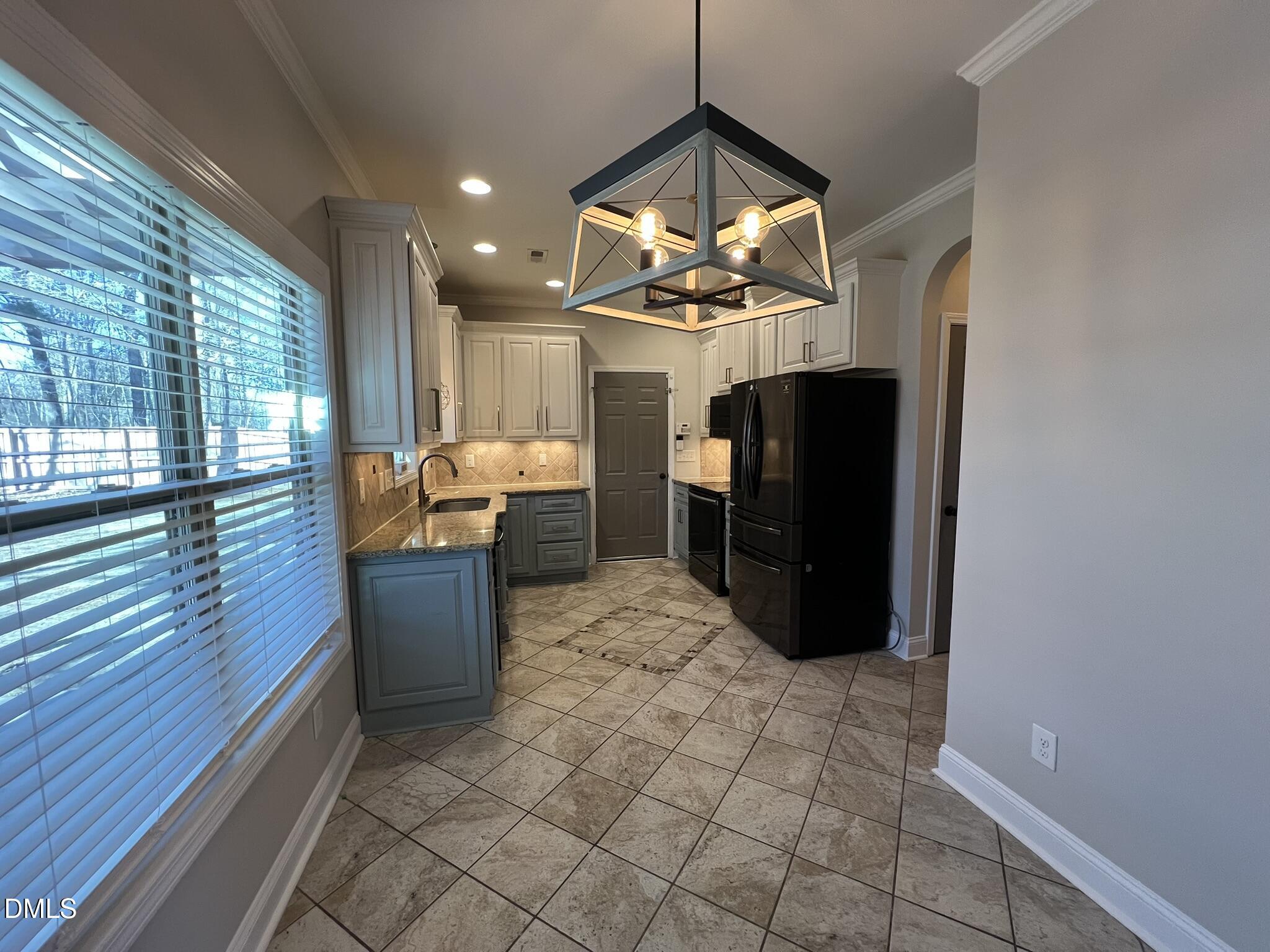 19 Eaton Drive Angier, NC 27501 - Photo 4 of 17 a view of a workspace with furniture