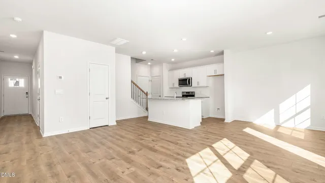 a view of kitchen with wooden floor