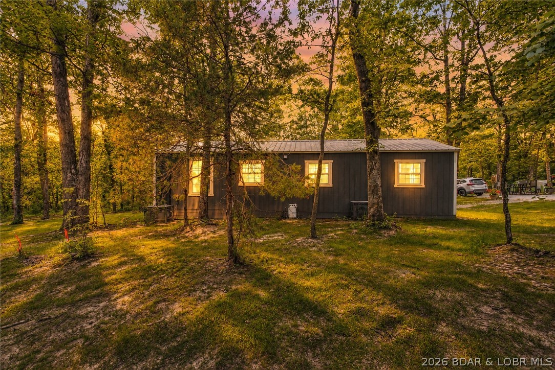 25145 State Route West Barnett, MO 65011 - Photo 55 of 58 The evening Glow, kissed by trees, digitally enhan