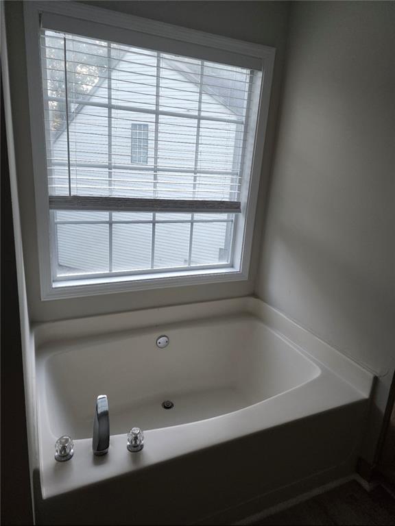 138 Shady View Place Lawrenceville, GA 30044 - Photo 14 of 21 a close up of a bathtub