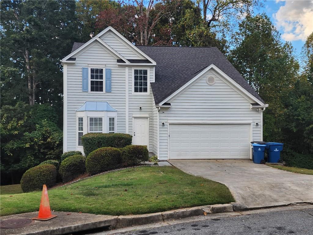 138 Shady View Place Lawrenceville, GA 30044 - Photo 2 of 21 a view of a house with a yard