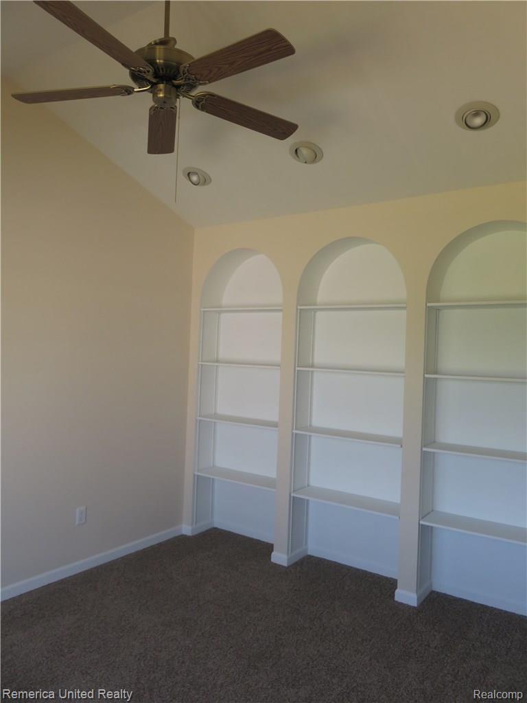 1281 East Jones Road Howell, MI 48855 - Photo 10 of 21 Private Main Floor Office With Glass French Doors & Custom Built Book Cases