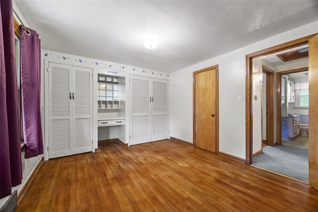 1233 Virginia Avenue Midland, PA 15059 - Photo 21 of 44 wooden floor and closet in a room