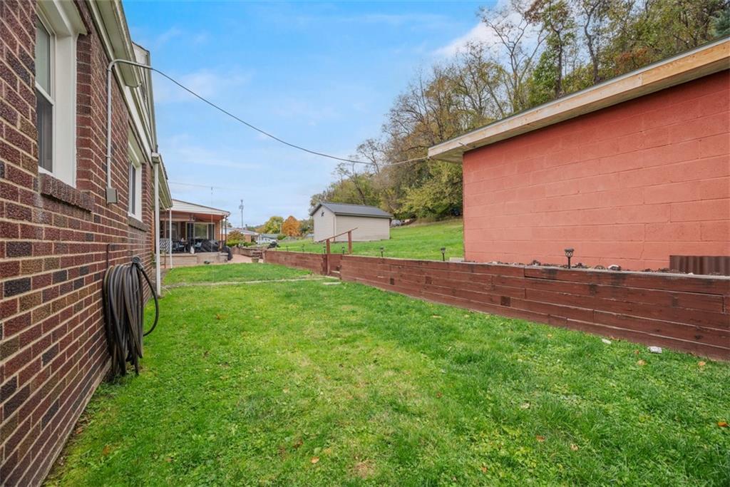 1233 Virginia Avenue Midland, PA 15059 - Photo 36 of 44 a view of a yard and porch