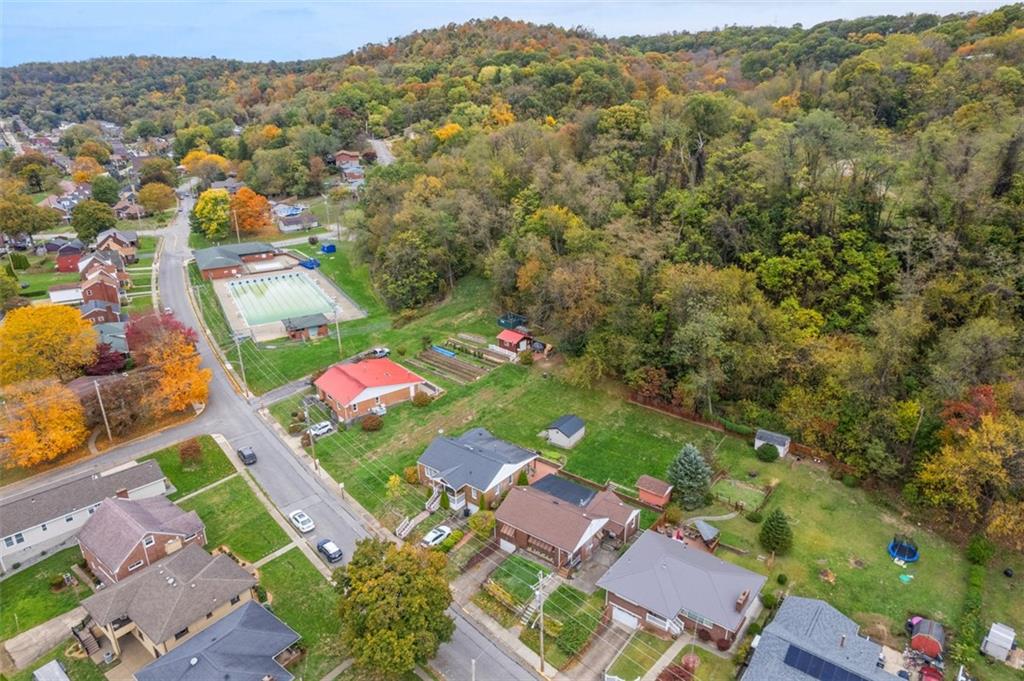 1233 Virginia Avenue Midland, PA 15059 - Photo 40 of 44 an aerial view of residential houses with outdoor space