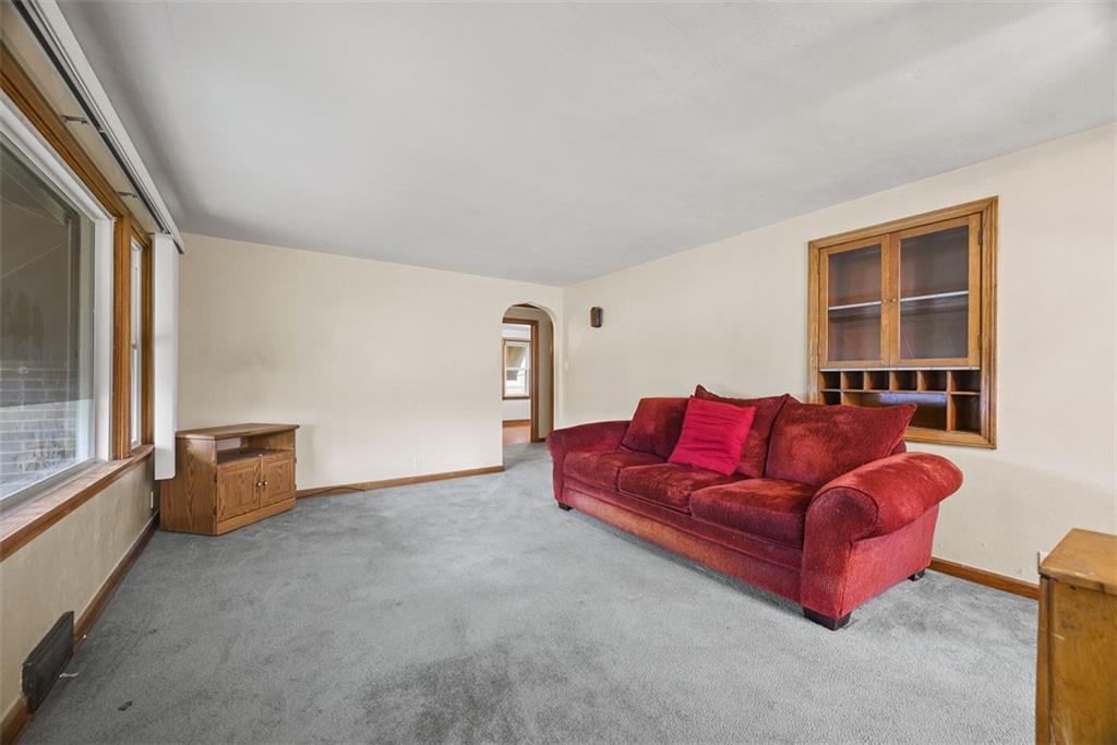 1233 Virginia Avenue Midland, PA 15059 - Photo 7 of 44 a living room with furniture and a window