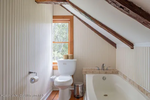 a bathroom with a sink and toilet