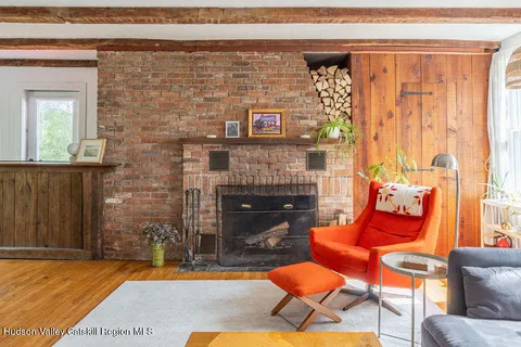 a building with furniture and a fireplace