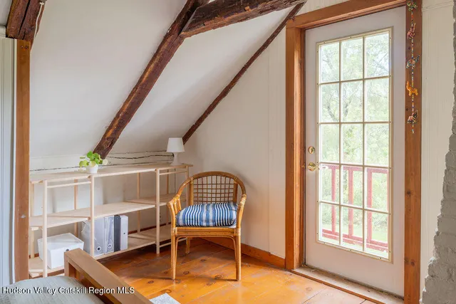 a room with furniture and a window