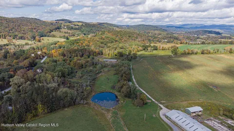 a view of a lake in middle of the town