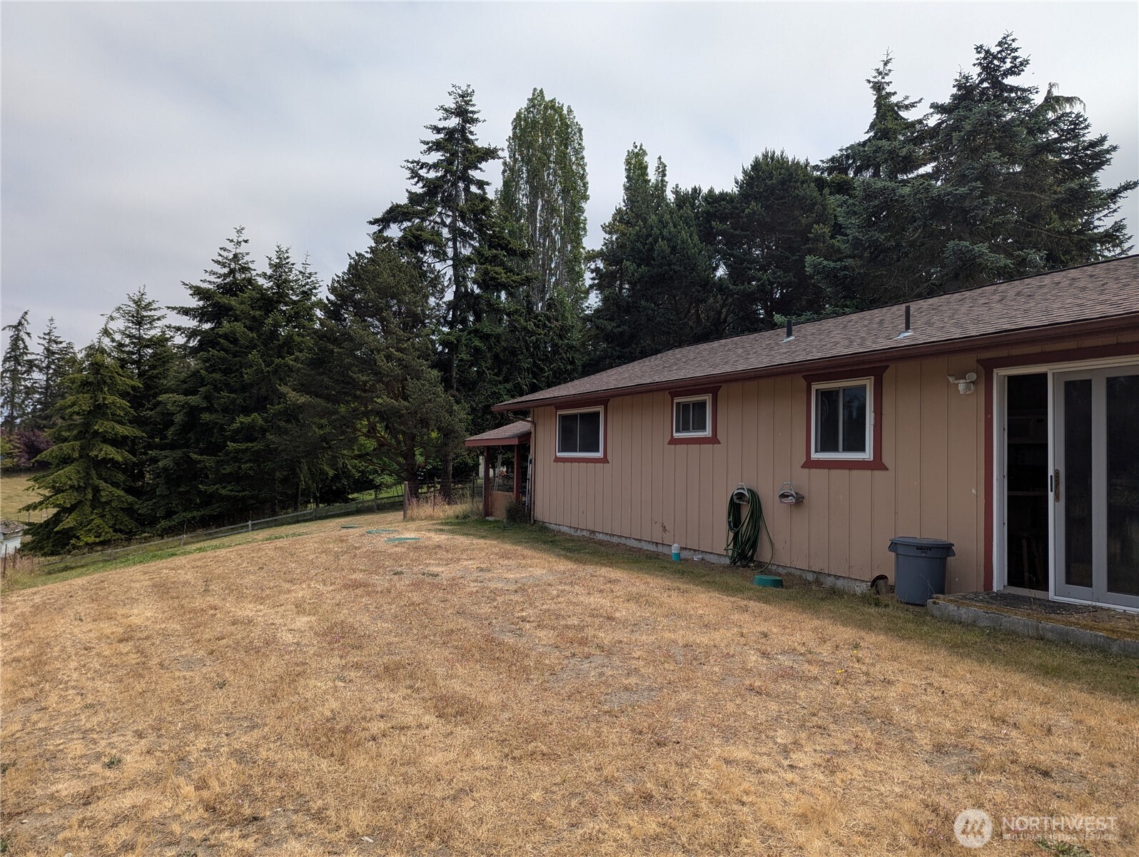 72 Ridge View Drive Sequim, WA 98382 - Photo 26 of 31 a view of a house with a backyard