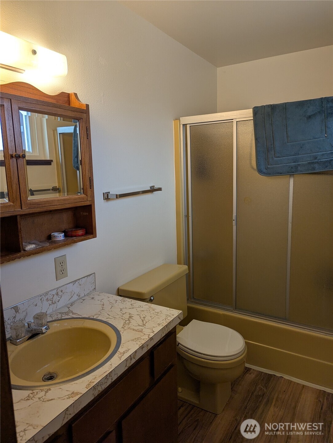 72 Ridge View Drive Sequim, WA 98382 - Photo 9 of 31 a bathroom with a granite countertop toilet sink and mirror
