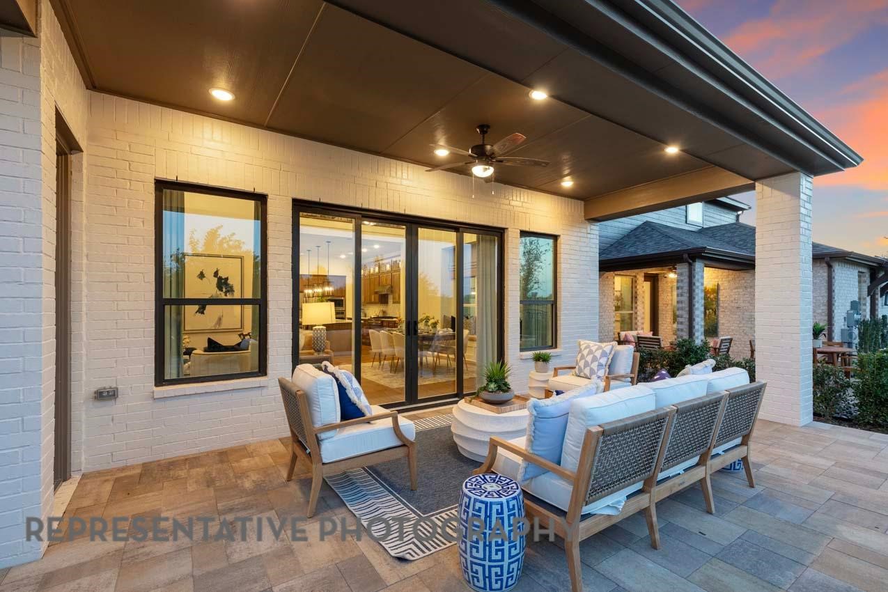 21235 Natalia Grove Magnolia, TX 77355 - Photo 29 of 34 a living room with furniture and large windows