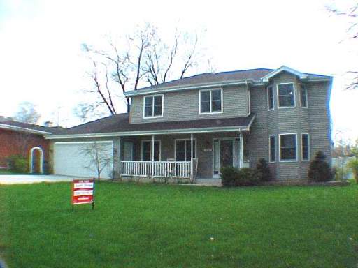 17847 Howe Avenue Homewood, IL 60430 - Photo 1 of 1 a view of a house with backyard and garden