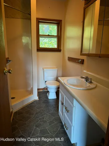 an aerial view of a house with a garden