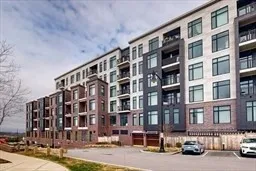 a front view of a building with street view