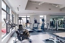 191 Washington Street, Unit 720 Boston, MA 02135 - Photo 14 of 19 a view of a room with gym equipment