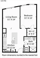 a picture of a bathroom with a shower and a mirror