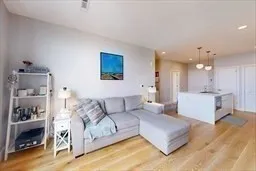a living room with furniture and a bath tub