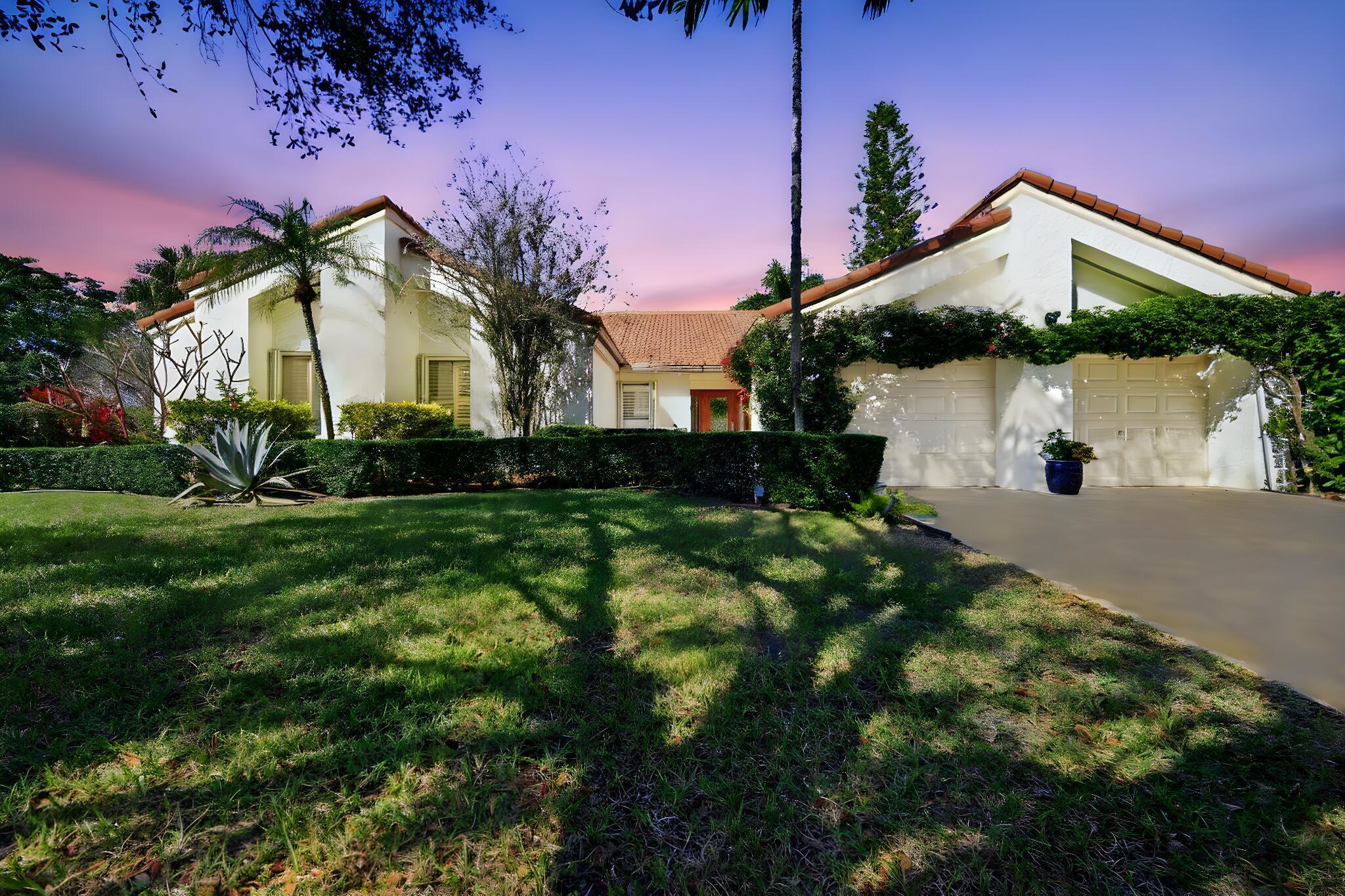 11703 Sunfish Way Cooper City, FL 33026 - Photo 1 of 25 a front view of a house with garden
