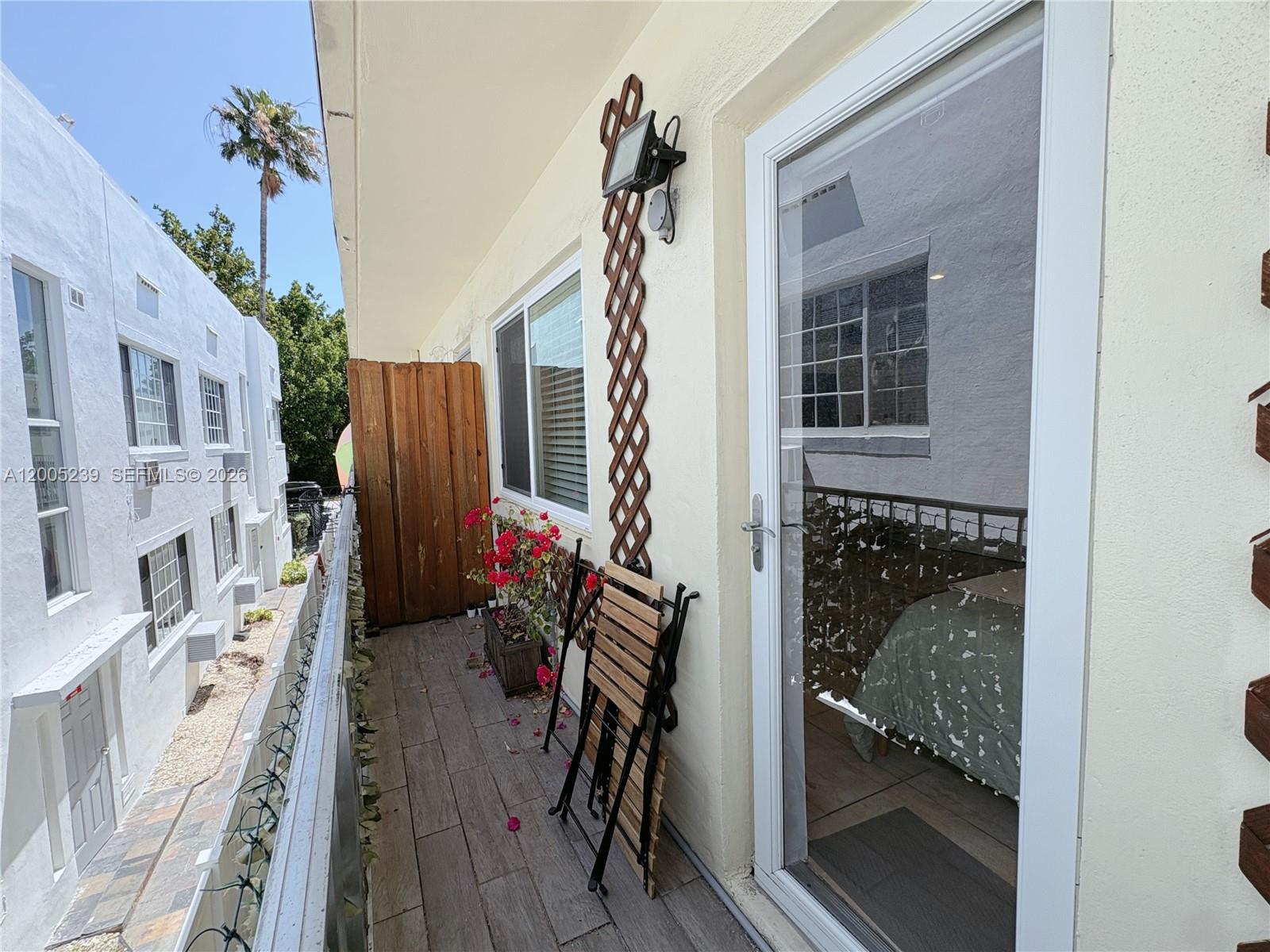 944 Meridian Avenue, Unit 11 Miami Beach, FL 33139 - Photo 14 of 14 a very nice looking room with a chair