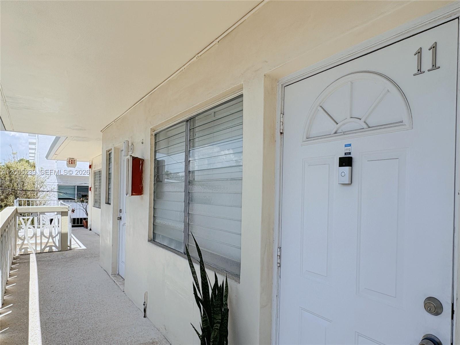 944 Meridian Avenue, Unit 11 Miami Beach, FL 33139 - Photo 2 of 14 a bathroom with a bathtub and shower