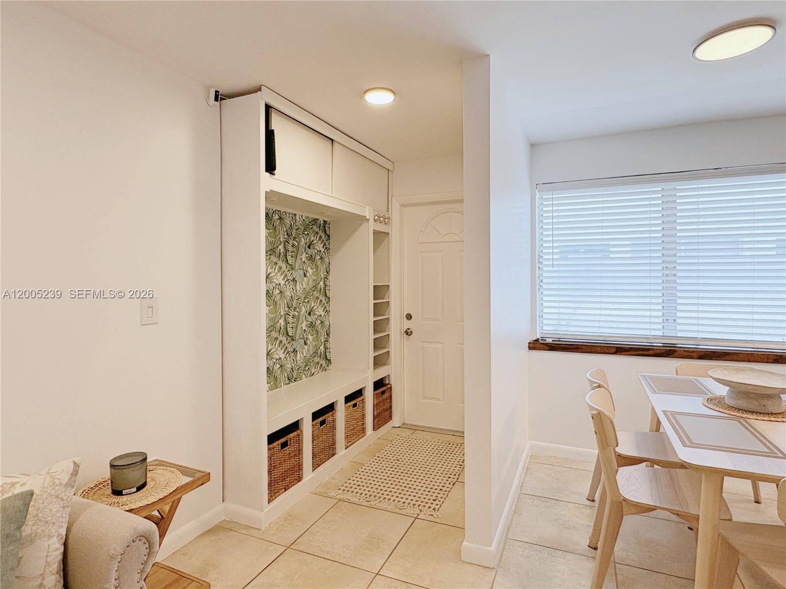 944 Meridian Avenue, Unit 11 Miami Beach, FL 33139 - Photo 3 of 14 a bathroom with a bathtub and a shower